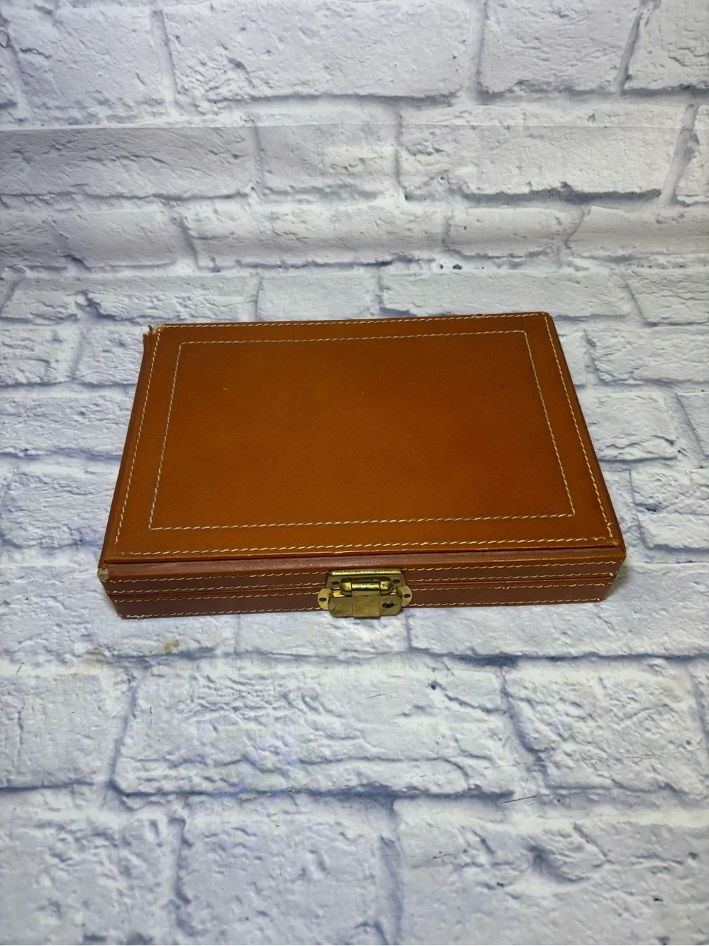 Mid century jewelry box with all the jewelry seen in pictures. Cuff links, tie